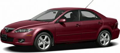 Side profile of sedan with sleek design and alloy wheels