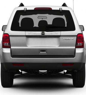 Rear view showing tailgate, taillights, rear window with wiper.