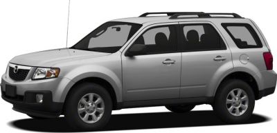 Side profile of silver SUV with roof rails and alloy wheels