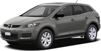 Front-side view of SUV with bold grille and smooth body lines