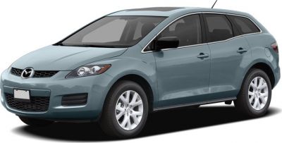 Front side view of a compact SUV with alloy wheels and sleek headlamps