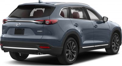 Rear view with dual exhaust and sleek taillights
