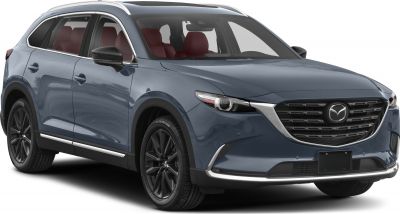 Front grille and side profile with black wheels and red interior seats