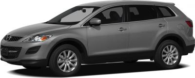 Side view of mid-size SUV with alloy wheels and tinted windows