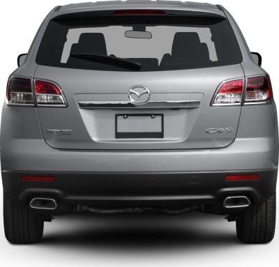 SUV rear view with taillights, dual exhaust, and rear windshield wiper