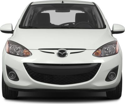 Sharp headlights, bold grille, fog lights on front view