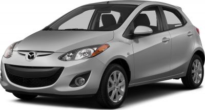 Front-side view of compact hatchback featuring headlights and grille
