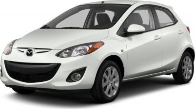 Front-side view of compact hatchback with sleek headlights and rounded body