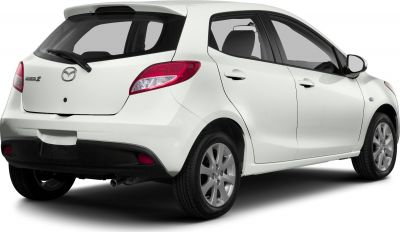 White hatchback rear side with tail lights and rear window