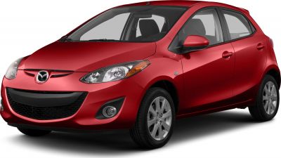 Front side view of compact hatchback with headlights and alloy wheels