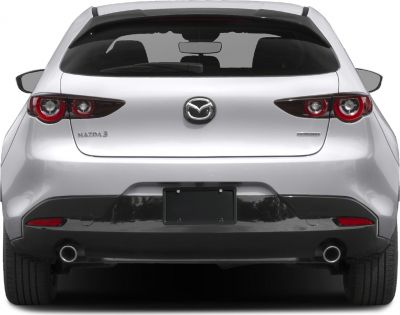 Rear view of a hatchback with dual exhausts and distinctive taillights