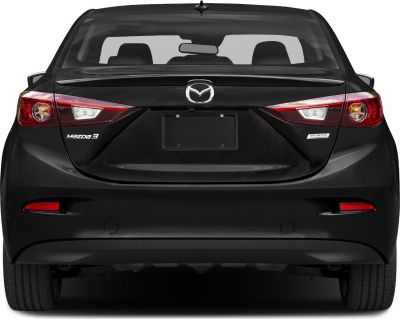 Rear view with distinct taillights and sleek trunk design