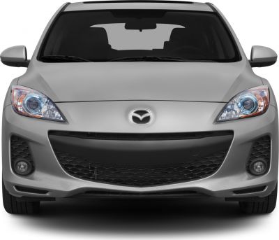 Front view showing grille, headlights, and fog lights