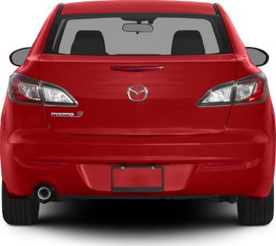 Red sedan rear with distinctive tail lights and central emblem badge