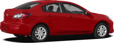 Red four-door sedan rear side view with alloy wheels and clear taillights