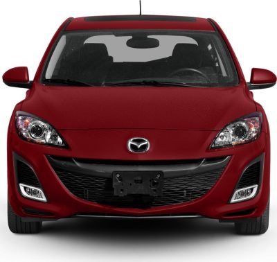 Front view of hatchback featuring grille, headlights, and side mirrors