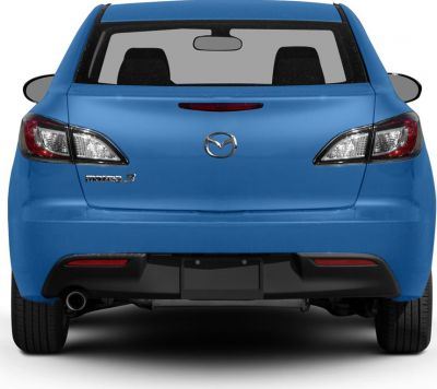 Rear view with taillights, rear windshield, and exhaust pipe