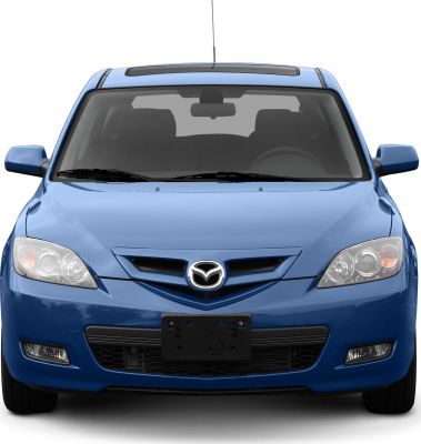 Front view showing grille, headlights, and hatchback design