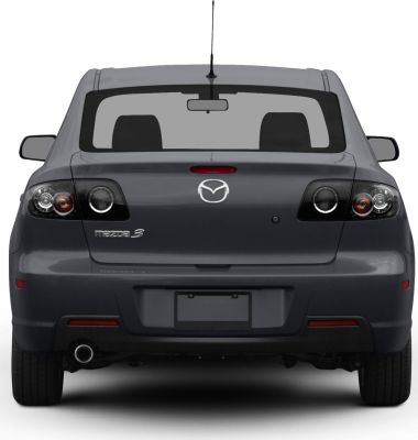 Distinctive rear taillights and rear design of a sedan.