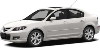 White four-door sedan side profile with alloy wheels and tinted windows