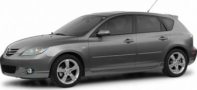 Side view of a hatchback with alloy wheels and fog lights