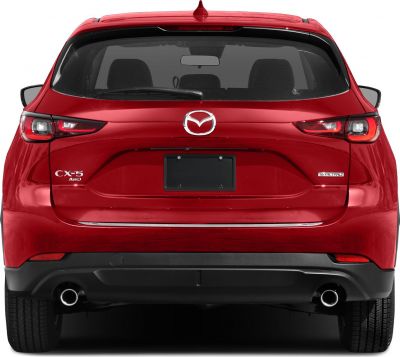 Rear view showing dual exhausts, CX-5 AWD and SKYACTIV-G badges, distinctive tail lights
