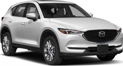 Front side view of white SUV with sleek headlights and alloy wheels