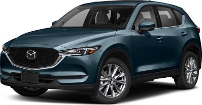 Front side view of an SUV with sleek headlights and alloy wheels