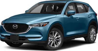 Front-left view of blue SUV with sleek headlight and grille.
