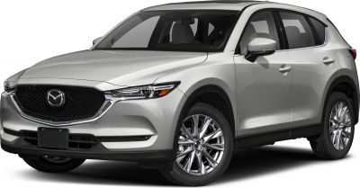 Front side view showing grille, headlights, and alloy wheels of compact SUV.