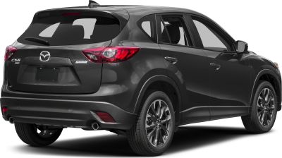 Rear side view with dual exhaust and LED tail lights.