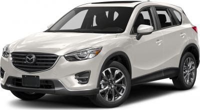 Front side view with headlights, grille, and alloy wheels