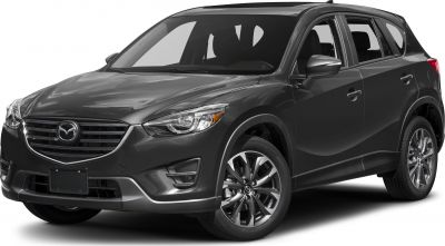 Front three-quarter view of SUV focusing on headlights and alloy wheels