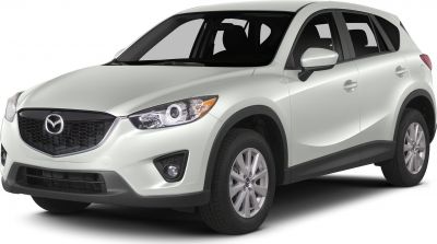 Front side view of a compact SUV with distinctive headlights and grille