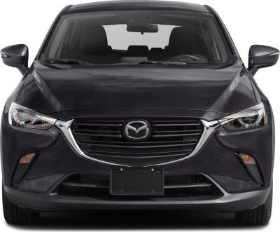 Front view showing grille, headlights, side mirrors, and license plate mount