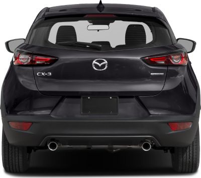 Rear view showing dual exhaust pipes and LED taillights of a compact SUV.