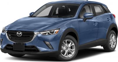 Front side view of blue compact SUV with alloy wheels and sleek headlights