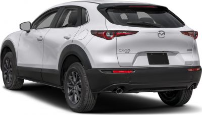 Rear side view of white compact SUV with black trim and dual exhaust pipes