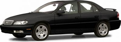 Side view of black four-door sedan with alloy wheels