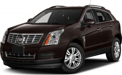 Front-side view of SUV with chrome grille and sharp headlights