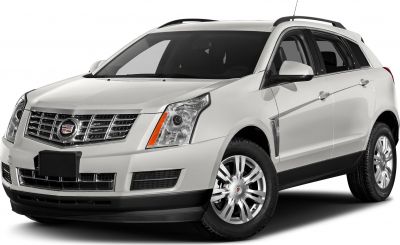 Front-side view of silver SUV with distinctive grille and headlights