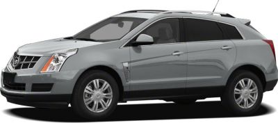 Side profile of silver SUV with roof rails and alloy wheels
