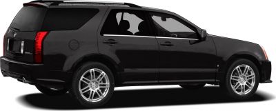 Black SUV side profile with alloy wheels and roof rails