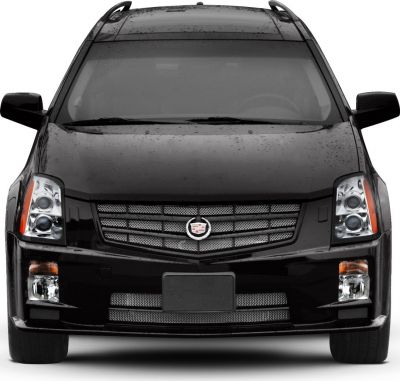 Front view with grille and dual round headlights