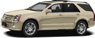 Side profile of a mid-2000s luxury SUV with beige paint and distinctive angular design