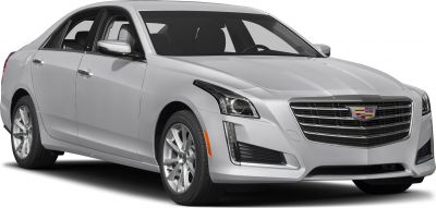 Front view of a luxury sedan with LED headlights and horizontal grille