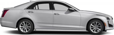 Side profile of silver sedan with alloy wheels and modern headlights
