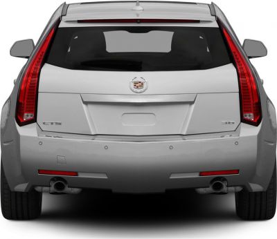 Rear view with vertical tail lights and dual exhaust pipes