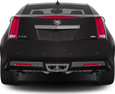 Rear tail lights and dual exhaust of a coupe