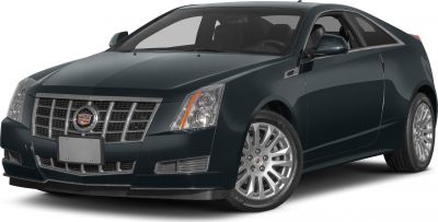 Front-side view with distinctive grille and sharp headlights
